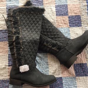Woman’s boots size 10.